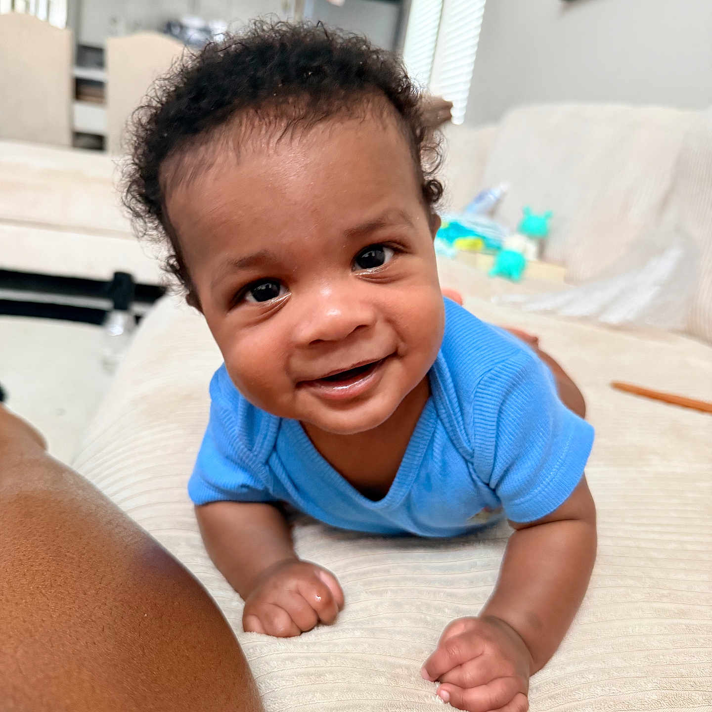 Aireon joined the competition — help win amazing prizes! baby, blue_shirt, child, couch, curtains, eyes, face, furniture, hair, hand, happy, home, indoors, infant, living_room, person, skin, smiling, toddler, window