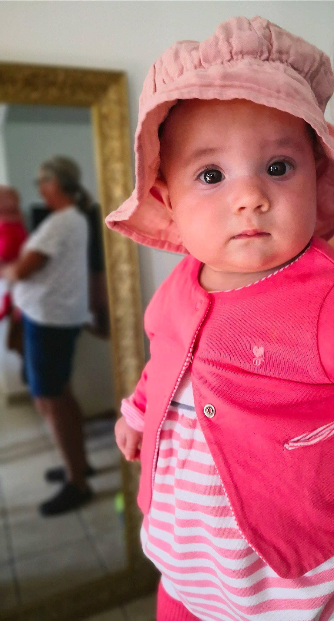 Agnès participe au concours pour gagner de l'argent avec cette photo : baby, baby_products, baby_toddler_clothing, cap, cheek, child, fashion_accessory, fun, happy, headwear, lip, magenta, nose, person, pink, shorts, skin, sleeve, sun_hat, t_shirt
