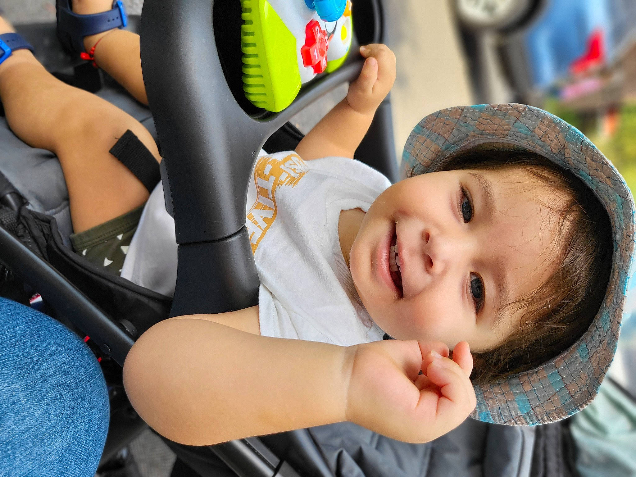 Maximilian joined the competition — help win amazing prizes! baby, baby_toddler_clothing, blue, cap, chair, child, dress, face, finger, fun, happy, hat, headgear, joy, leisure, person, recreation, smile, sun_hat, thigh
