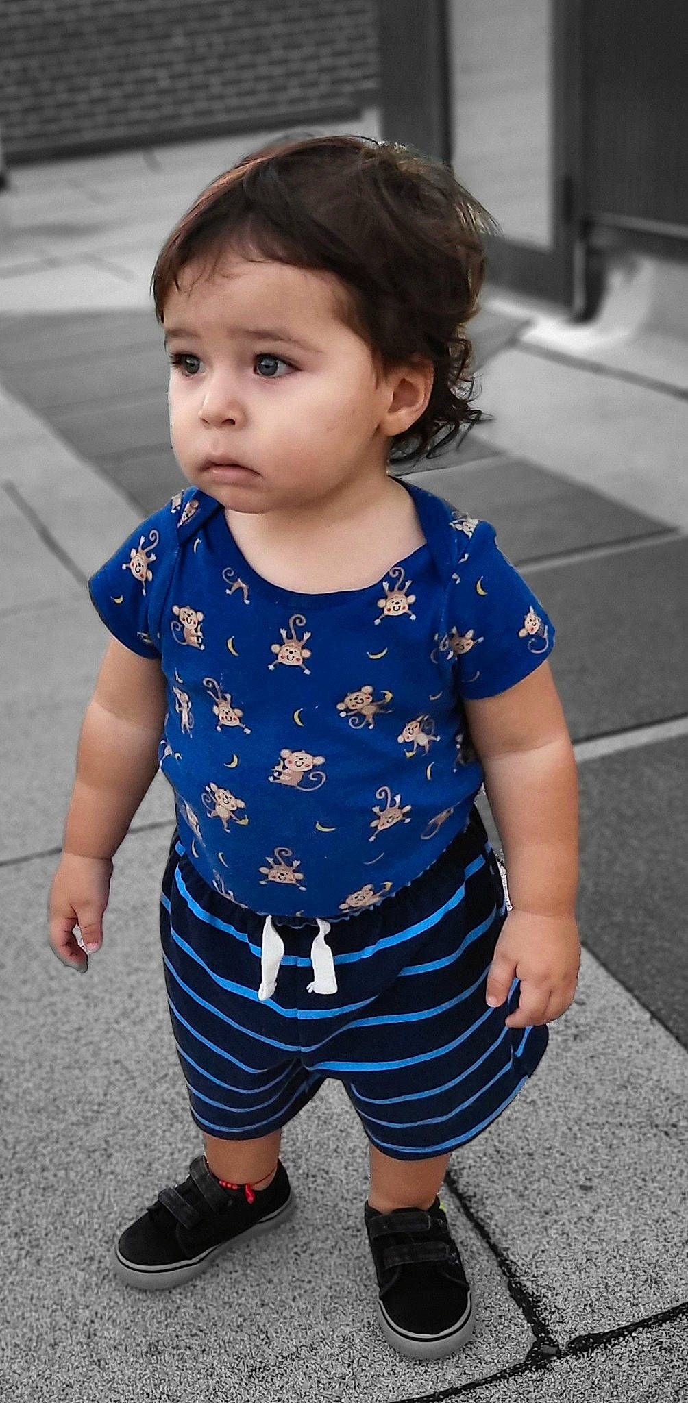 Maximilian is registered to the contest to win money with this photo: azure, baby, baby_toddler_clothing, black, blue, child, chin, face, hair, happy, human, joint, neck, person, photograph, skin, sleeve, smile, standing, toddler