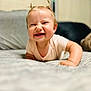 baby, child, crawling, smiling, toothy_grin, hair_tufts, bed, blanket, indoor, soft_lighting, cute, infant, happy, person, portrait, toddler, clothing, skin, closeup, expression