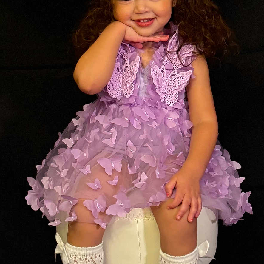 Aubrey joined the competition — help win amazing prizes! balloon, child, clothing, dress, eveningdress, face, female, flower, flowerarrangement, flowerbouquet, footwear, girl, head, hosiery, person, plant, purple, shoe, sock, sphere