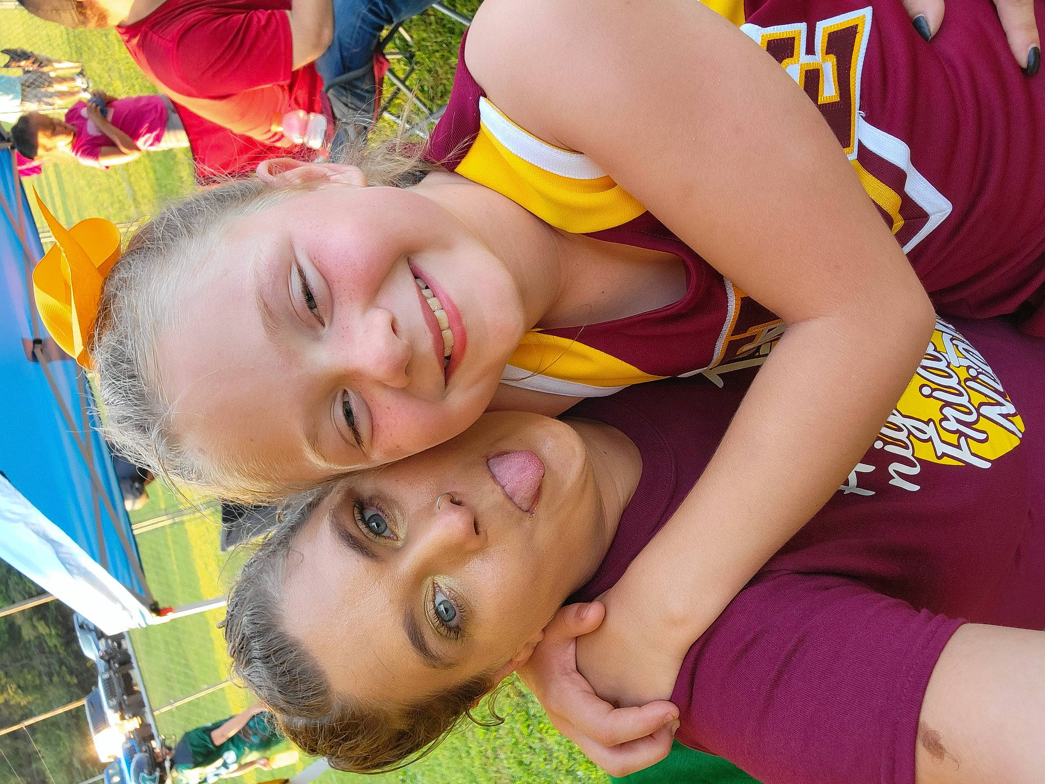 Adleigh is registered to the contest to win money with this photo: chest, child, event, fun, grass, happy, human_leg, joy, leisure, mouth, people, person, plant, recreation, shorts, smile, summer, swimwear, t_shirt, thigh