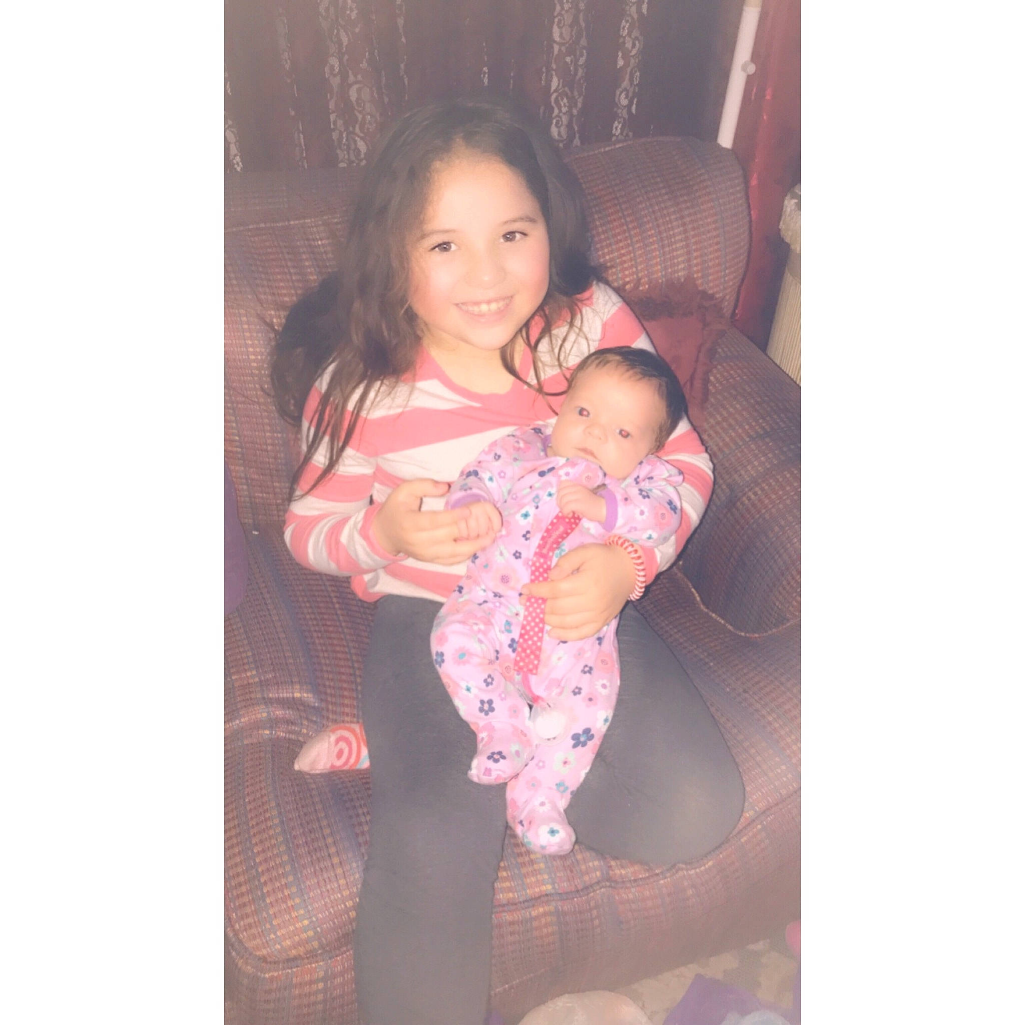 Neveah is registered to the contest to win money with this photo: baby, beauty, child, daughter, family, happy, head, iris, joy, love, mother, person, pink, product, sitting, skin, smile, snapshot, toddler