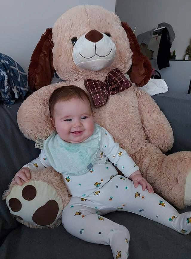 Hélèna participe au concours pour gagner de l'argent avec cette photo : baby, baby_toddler_clothing, child, comfort, couch, football, fun, happy, head, joy, linens, mammal, people, person, plush, smile, sports_equipment, stuffed_toy, textile, toddler