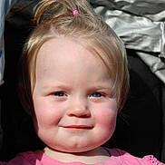 Athena is registered to the contest to win money with this photo: toddler, child, girl, blonde_hair, pink_shirt, smile, portrait, face, rosy_cheeks, sunlight, outdoor, cute, happy, baby, young_child, person, closeup, headshot, casual_clothing, natural_light