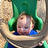 baby, beige, blue_clothing, child, daylight, fun, green, hands, happy, outdoor, play, playcore, playground, seat, smiling, sunlight, swing, toddler, woodchips, young_child