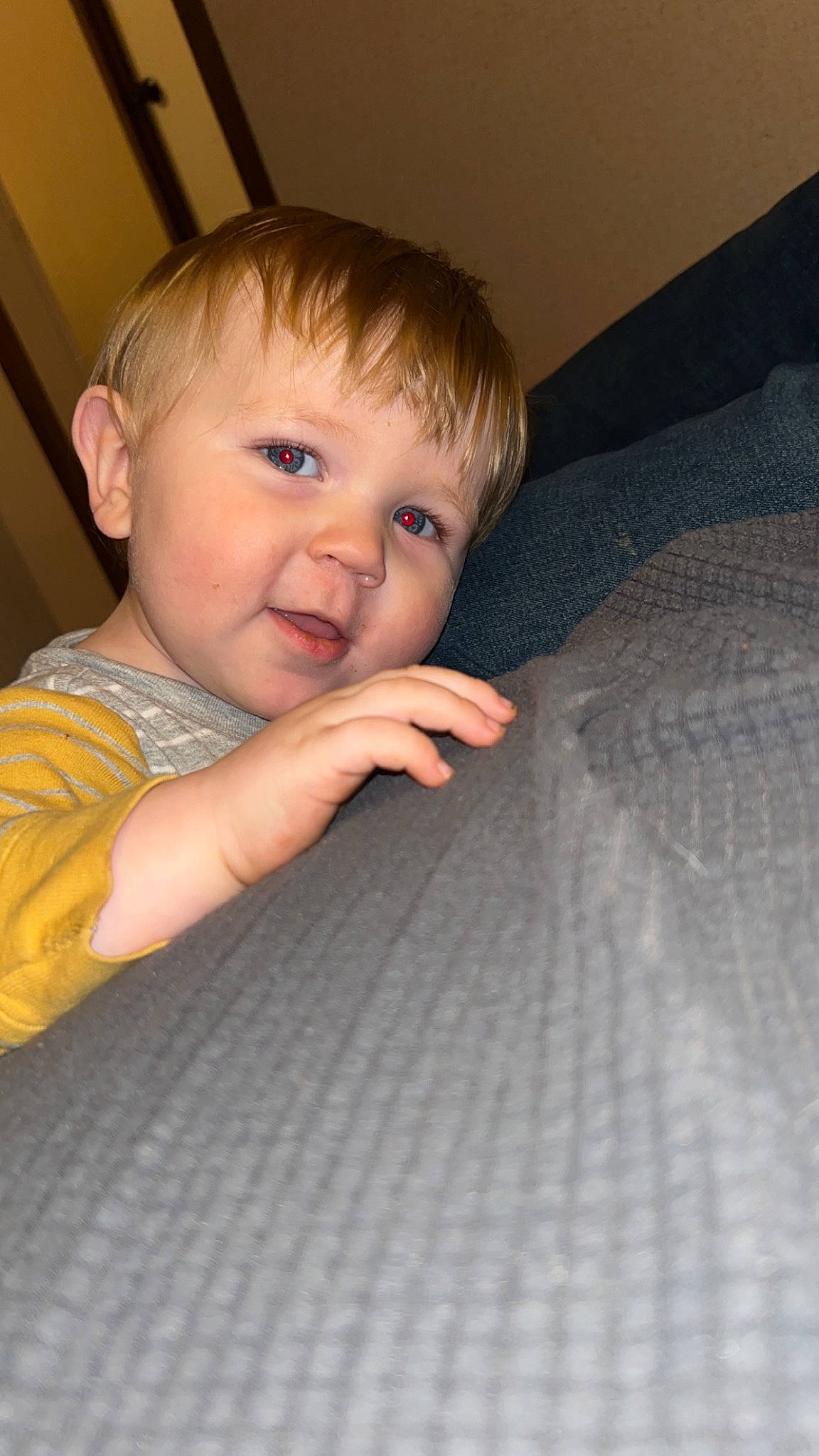 Kayson is registered to the contest to win money with this photo: baby, baby_toddler_clothing, cheek, child, chin, comfort, eye, finger, flooring, fun, iris, mouth, nose, person, sitting, skin, sleeve, smile, thumb, toddler