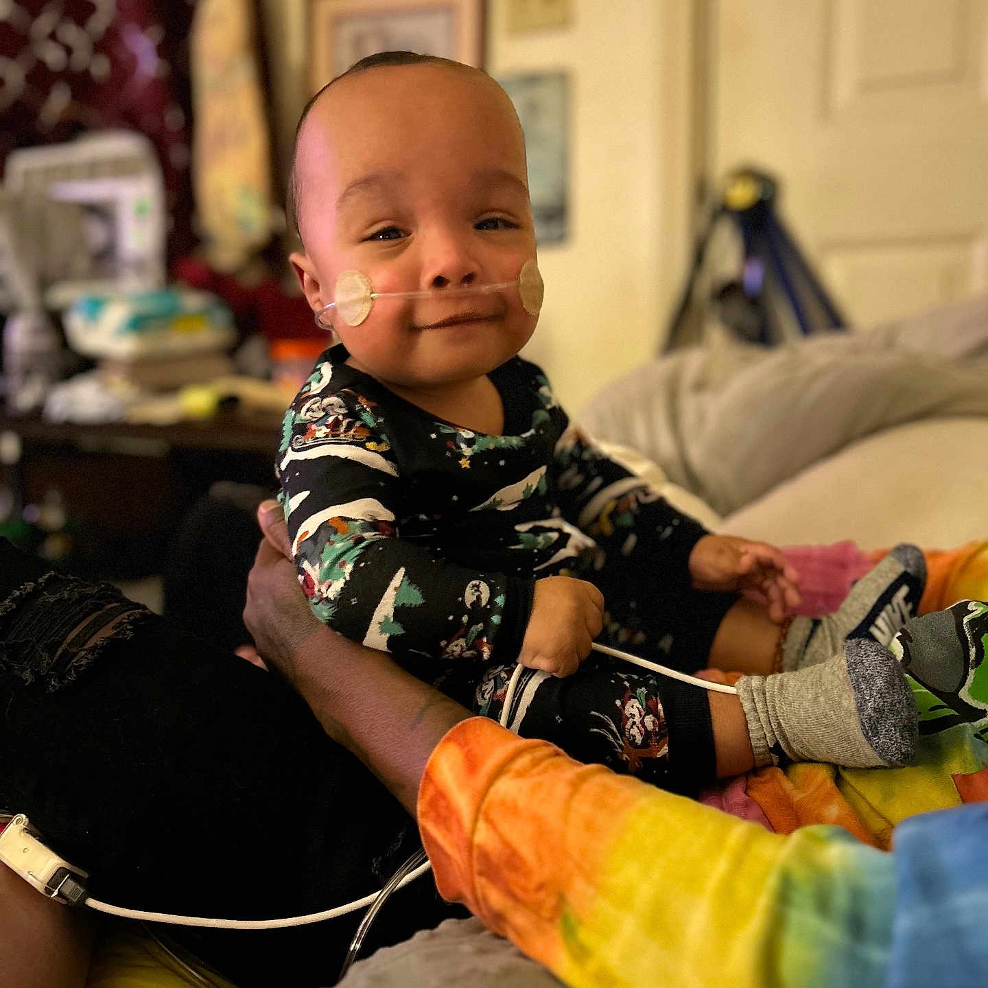 Billy Kash is registered to the contest to win money with this photo: baby, bodypart, clothing, couch, cushion, face, finger, footwear, furniture, glove, hand, head, homedecor, pants, person, photography, portrait, shoe, shorts, sitting