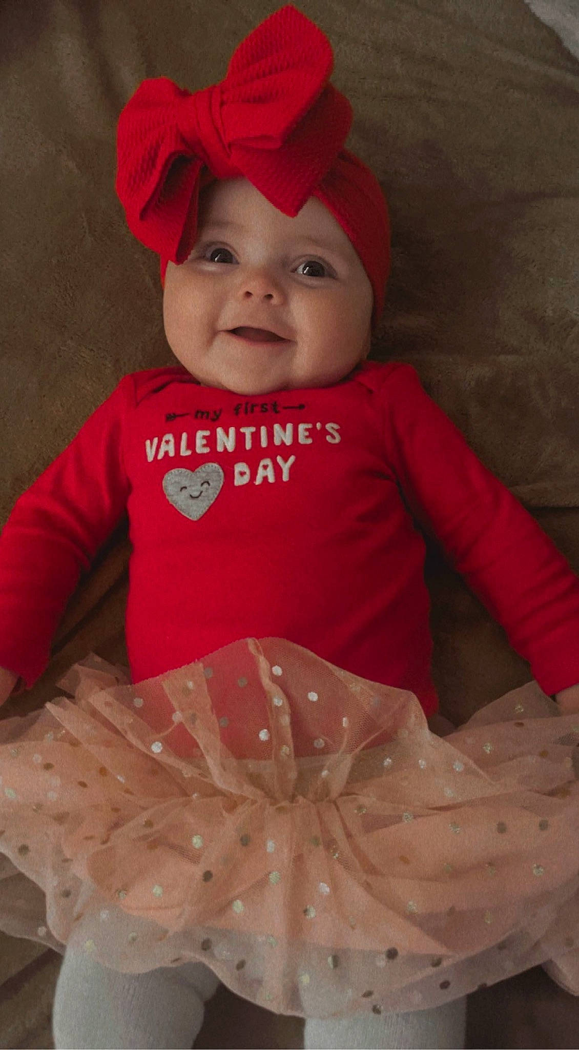 Emberlee is registered to the contest to win money with this photo: baby, baby_toddler_clothing, baseball_cap, cap, child, cool, face, facial_expression, happy, headgear, headwear, joy, magenta, organ, outerwear, person, pink, red, sleeve, smile