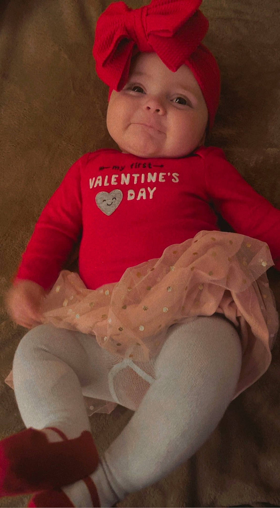 Emberlee is registered to the contest to win money with this photo: baby, baby_toddler_clothing, cap, chin, cool, eye, face, facial_expression, happy, head, headwear, lip, mouth, muscle, person, pink, skin, sleeve, smile, t_shirt