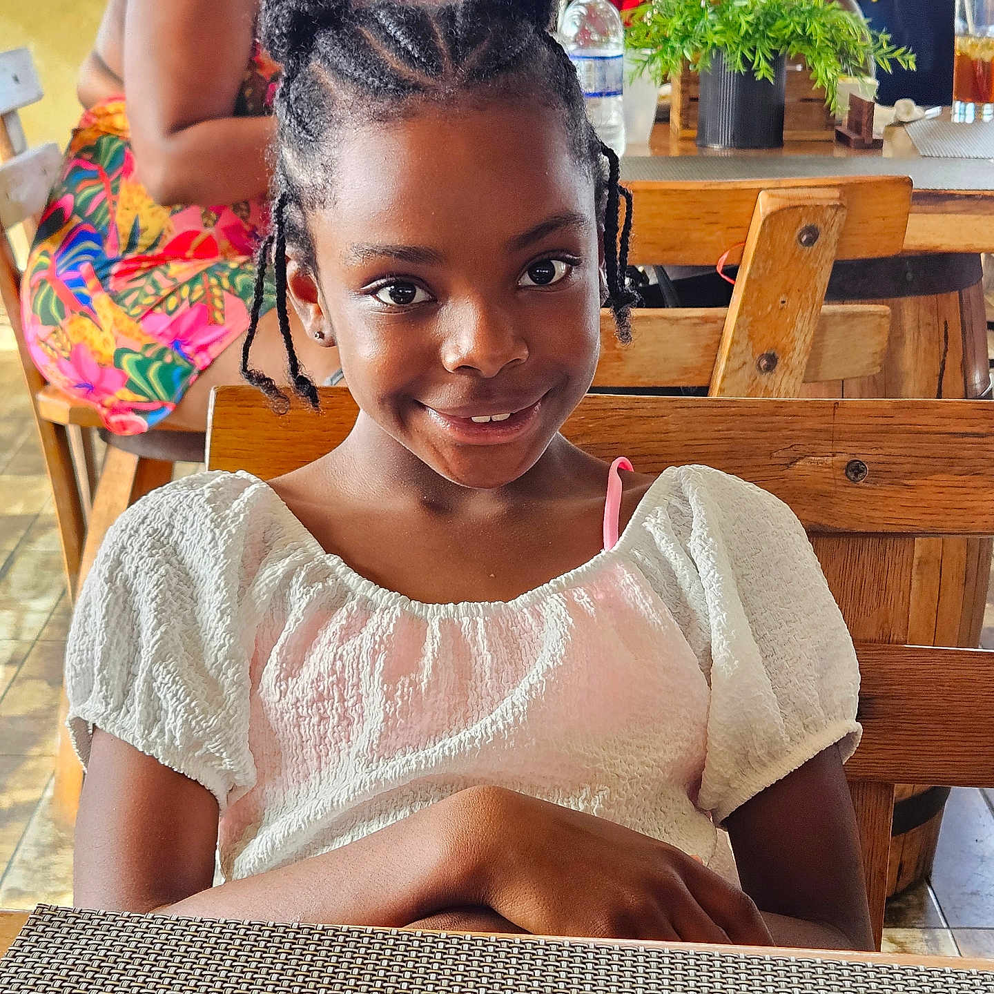 Kaleah is registered to the contest to win money with this photo: adult, child, clothing, face, female, furniture, girl, happy, head, indoors, male, man, person, photography, portrait, restaurant, smile, table, woman, wood