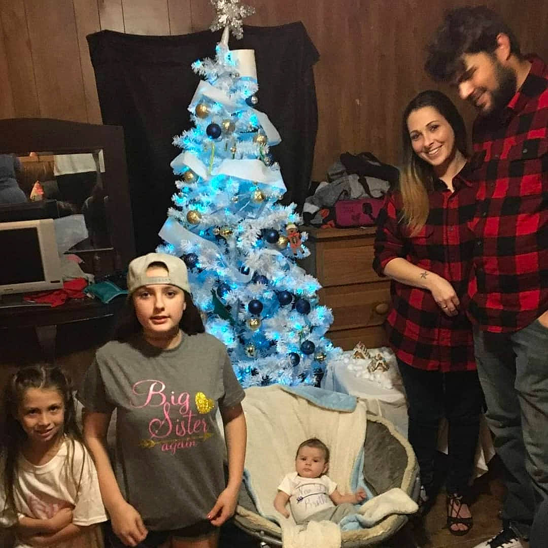 Collin joined the competition — help win amazing prizes! christmas, christmas_decoration, christmas_ornament, christmas_tree, fashion, fun, happy, head, headwear, holiday_ornament, joy, lap, lighting, organ, person, photograph, plaid, smile, standing, tartan