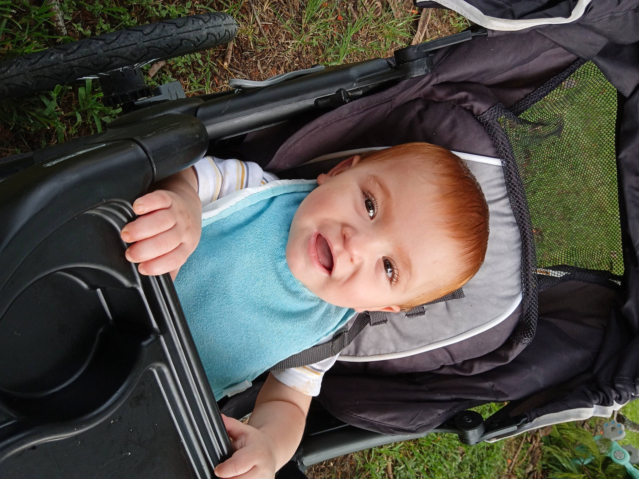 Caeden joined the competition — help win amazing prizes! baby, baby_carriage, baby_products, baby_safety, baby_toddler_clothing, car_seat, child, comfort, eye, facial_expression, fun, grass, green, leisure, mammal, person, plant, sitting, smile, toddler