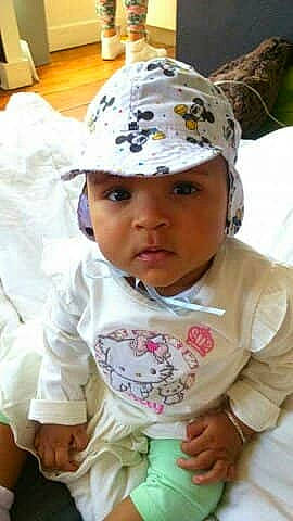 Layanna participe au concours pour gagner de l'argent avec cette photo : baby, bonnet, cap, child, headgear, headwear, person, play, toddler