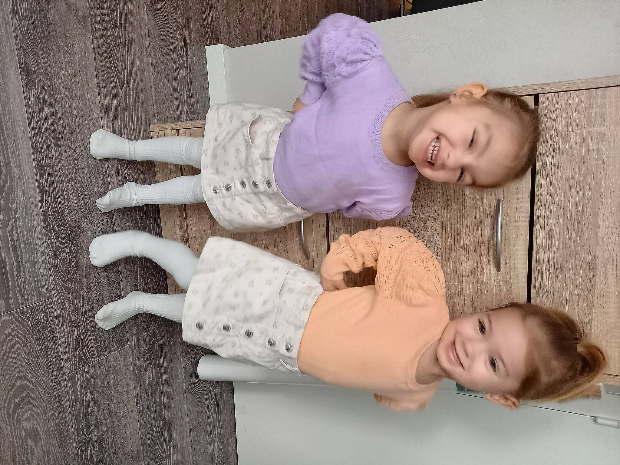 Celyanna Et Mila a rejoint le concours — aidez-le/la à gagner de superbes lots ! arm, baby, baby_products, baby_toddler_clothing, chair, child, comfort, flooring, happy, joy, knee, linens, person, room, sitting, skin, sleeve, smile, thigh, toddler