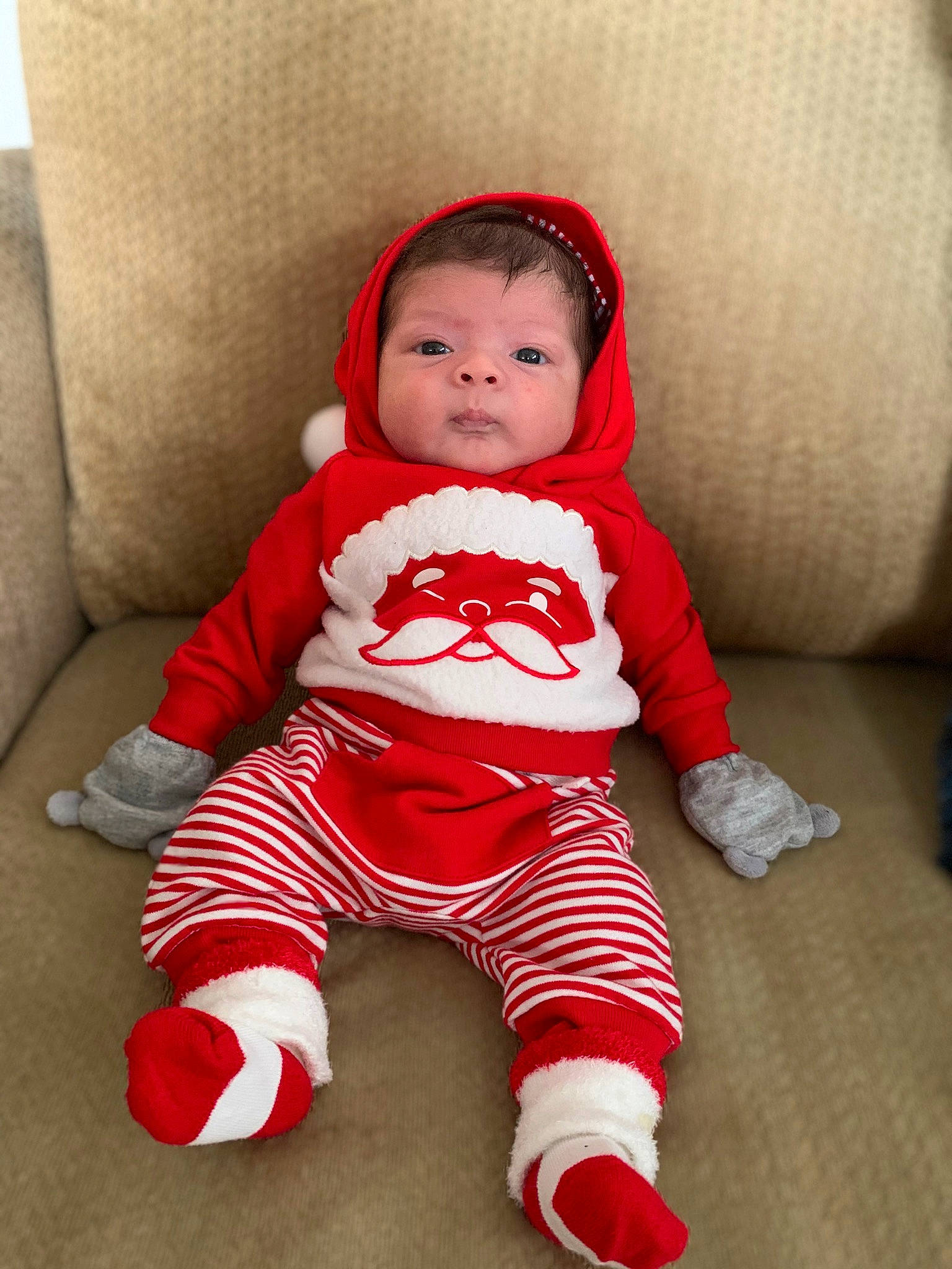 Marco is registered to the contest to win money with this photo: baby, baby_toddler_clothing, child, christmas, christmas_eve, head, person, red, skin, smile, toddler, white