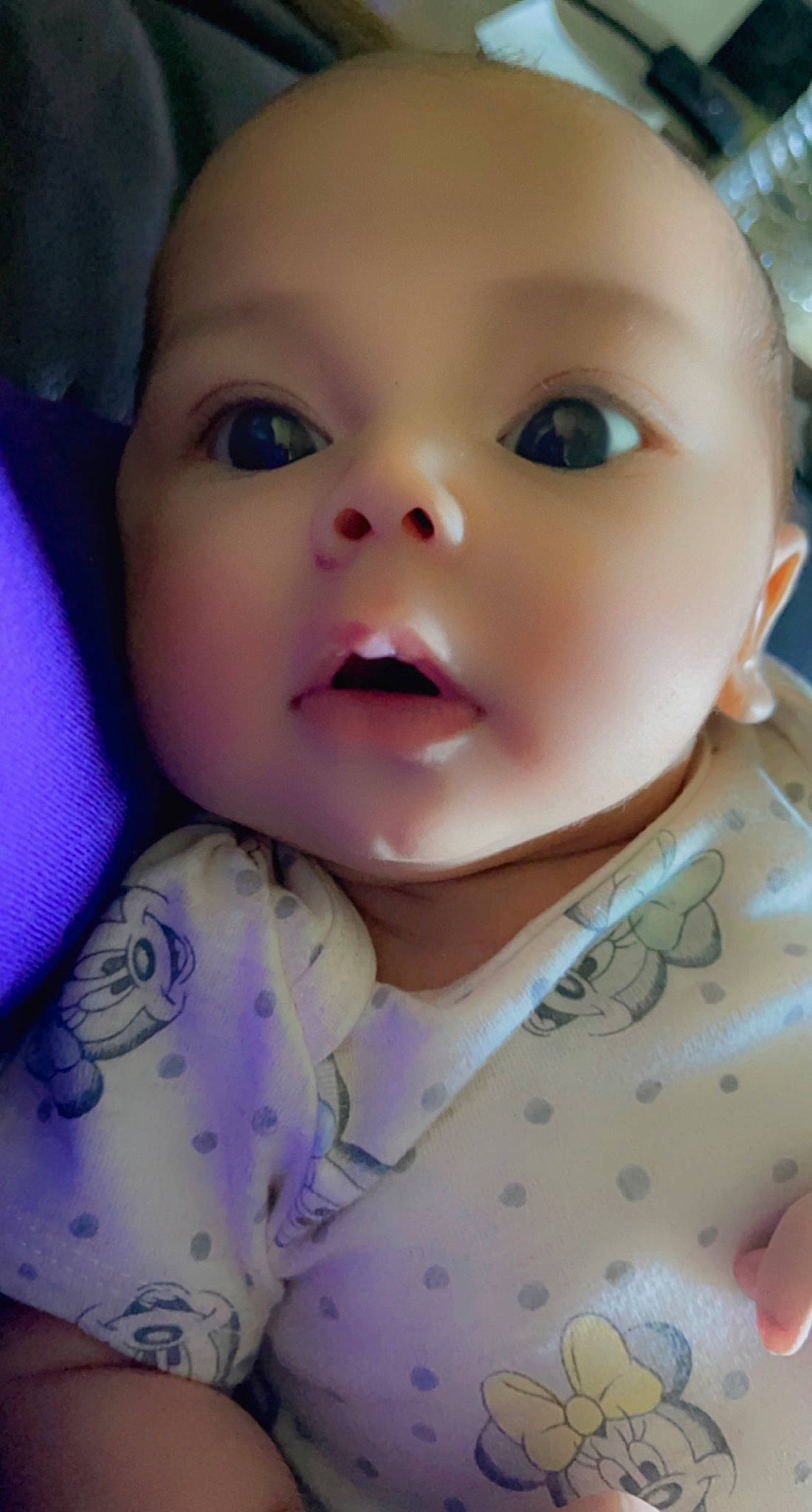 Camila is registered to the contest to win money with this photo: baby, baby_toddler_clothing, cheek, child, electric_blue, eye, eyebrow, eyelash, forehead, fun, iris, lip, mouth, nose, pattern, pink, skin, sleeve, toddler, toy