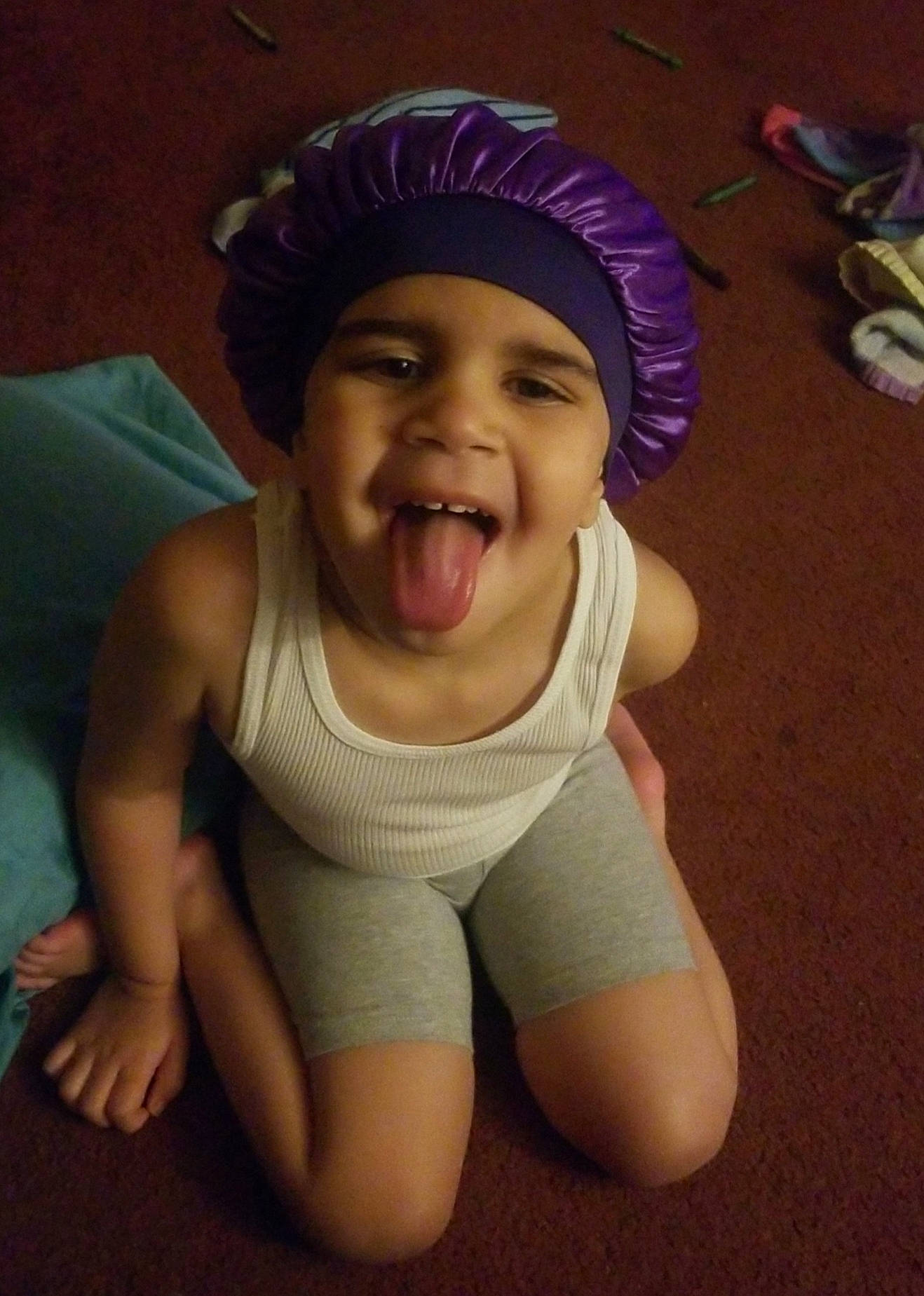 Kymber is registered to the contest to win money with this photo: arm, baby, cap, cheek, child, facial_expression, fun, happy, hat, head, headgear, headwear, laugh, person, sitting, skin, smile, toddler