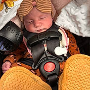 Adalyn joined the competition — help win amazing prizes! baby, blanket, bow, car_seat, child, closeup, clothing, cute, fan, footwear, headband, indoors, infant, newborn, peaceful, resting, safety_harness, sleeping, soft_texture, warm_colors