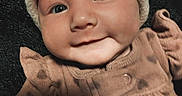 Adalyn is registered to the contest to win money with this photo: adorable, baby, baby_clothes, brown_clothing, child, close_up, cozy, cute, eyes, face, happy, hat, infant, infant_baby, knitted_hat, portrait, smile, spots, warm_clothing, young