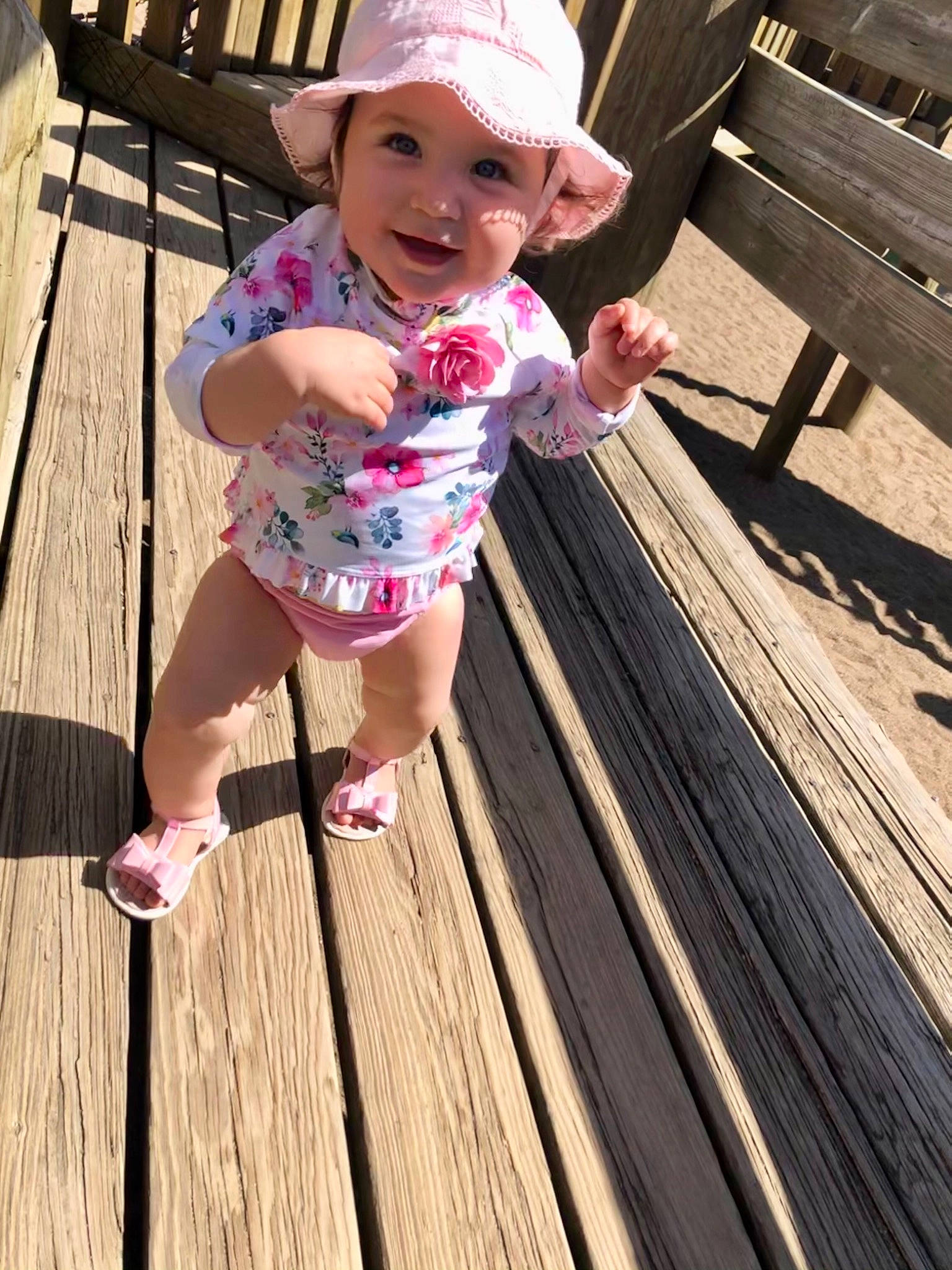 Haven joined the competition — help win amazing prizes! baby, baby_toddler_clothing, fun, grass, happy, hardwood, hat, headwear, joy, leisure, people_in_nature, person, pink, plank, recreation, skin, sleeve, smile, sun_hat, thigh