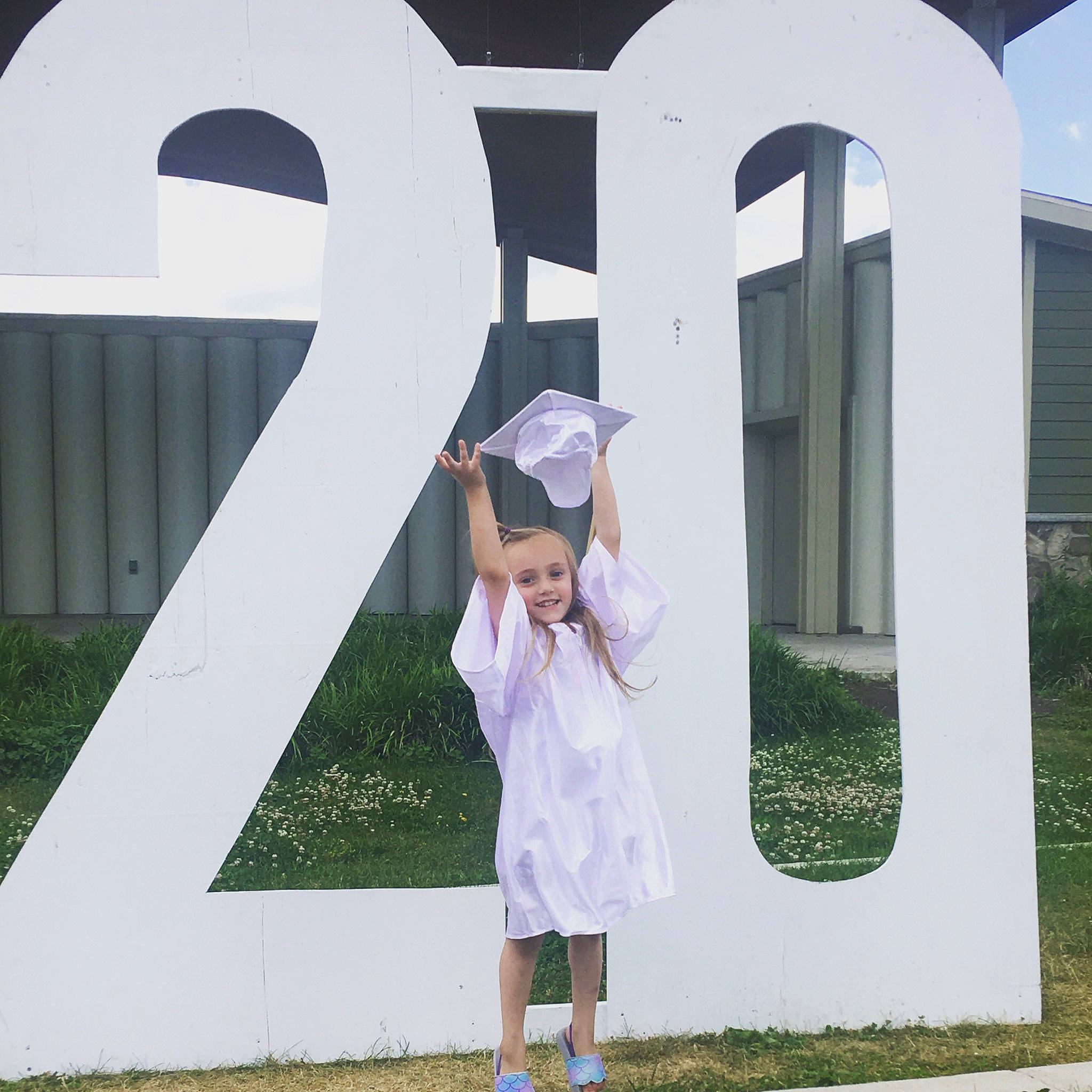 Peightyn is registered to the contest to win money with this photo: arch, architecture, child, dress, footwear, grass, house, joy, person, photography, pink, plant, shoe, tourism, tree, uniform, vacation, white, world