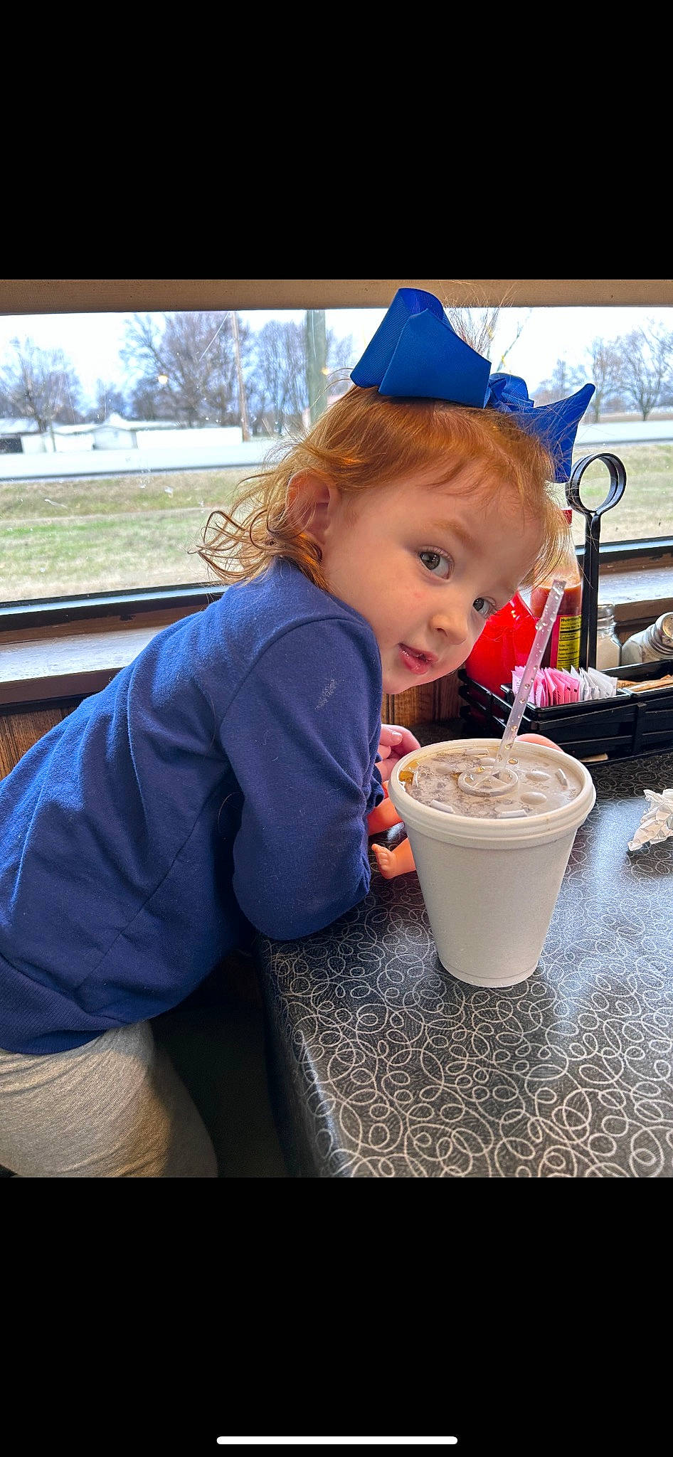 Haisley joined the competition — help win amazing prizes! child, coffee, costume_hat, cream, cuisine, cup, drink, drinking, drinkware, electric_blue, food, happy, ingredient, milk, mocaccino, non_alcoholic_beverage, party_hat, person, sweetness, toddler