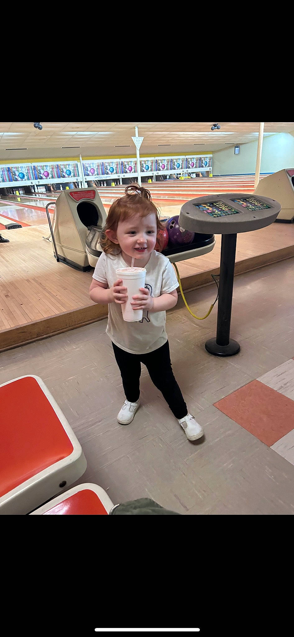 Haisley is registered to the contest to win money with this photo: automotive_design, child, desk, flooring, fun, hat, joy, leisure, person, play, recreation, room, shorts, sitting, smile, sportswear, t_shirt, table, toddler, vacation