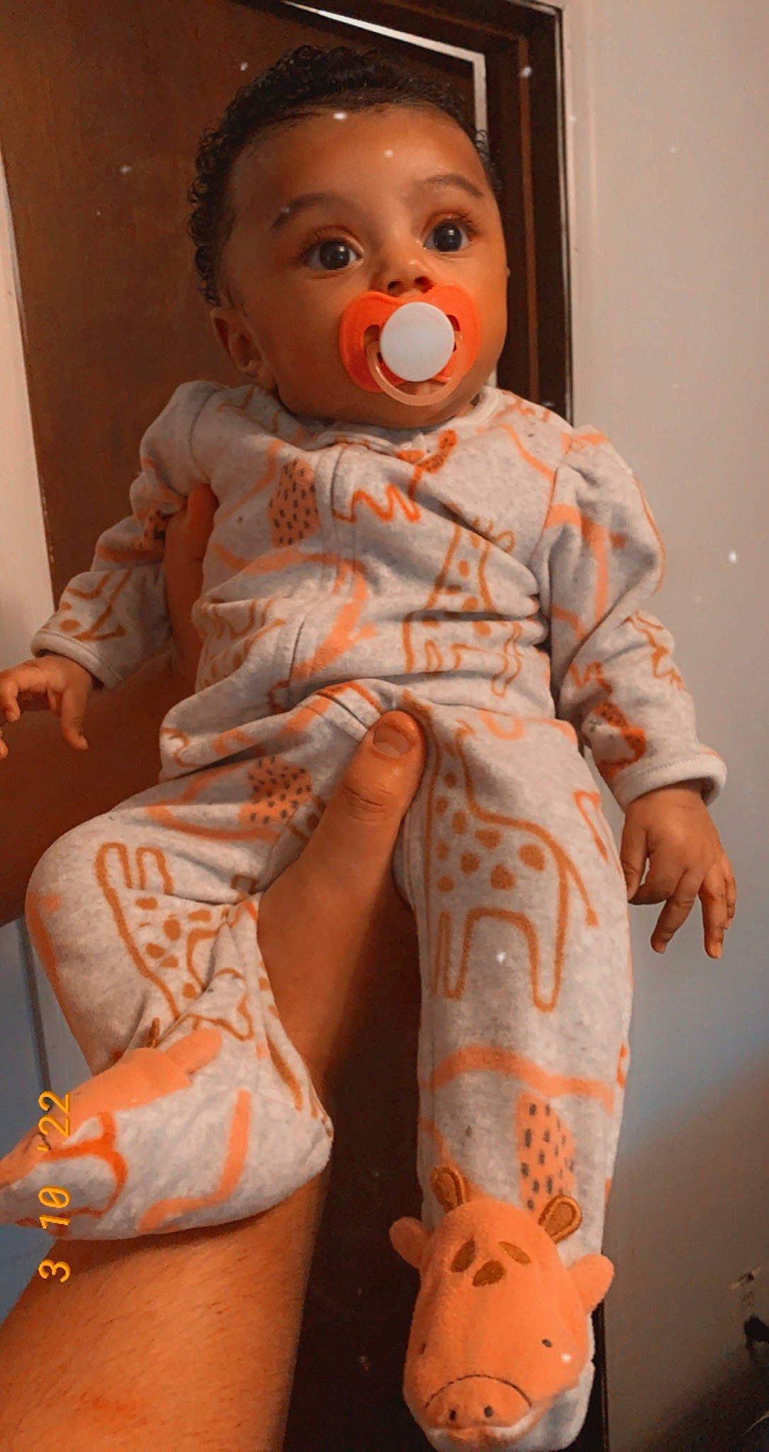 Ava is registered to the contest to win money with this photo: baby_toddler_clothing, cheek, chin, dress, eye, eyelash, face, hair, head, human_body, joint, leg, lip, neck, nose, orange, person, pink, skin, sleeve