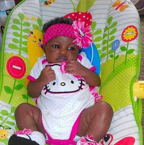 Ty'Miah joined the competition — help win amazing prizes! baby, baby_products, baby_toddler_clothing, bag, child, facial_expression, fashion_accessory, fun, happy, headwear, linens, magenta, person, pink, plush, purple, sitting, sleeve, stuffed_toy, toddler