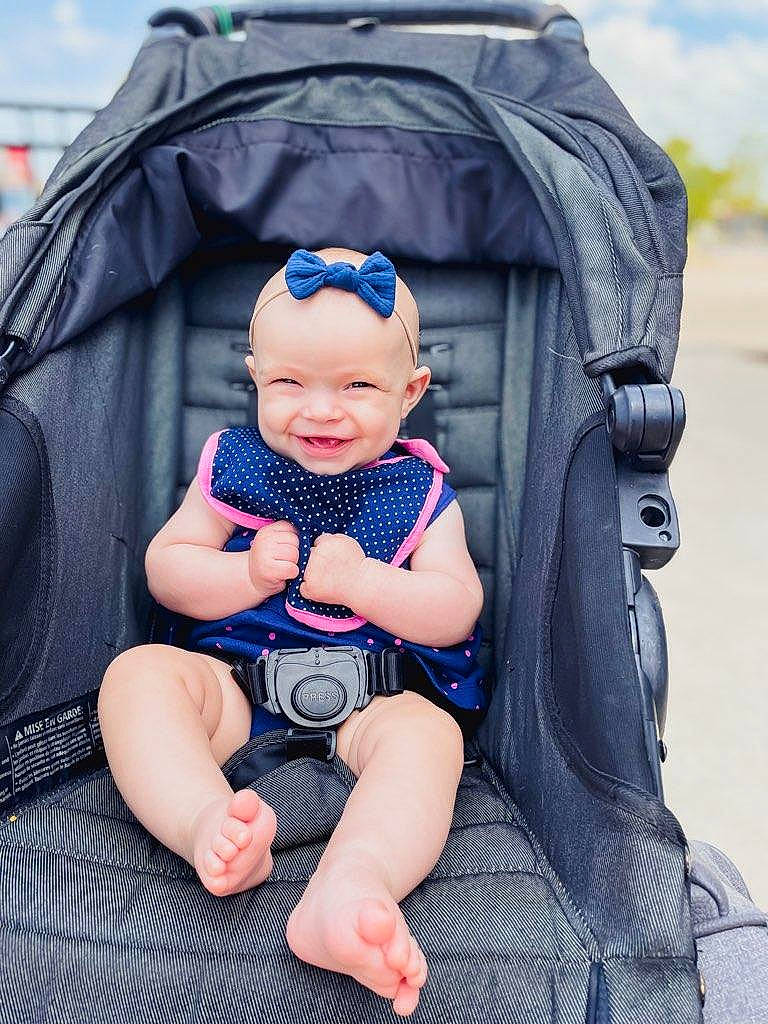 Ila joined the competition — help win amazing prizes! azure, baby, baby_carriage, baby_products, baby_toddler_clothing, blue, comfort, electric_blue, eye, facial_expression, fashion, fun, happy, headwear, joy, person, purple, skin, sky, smile