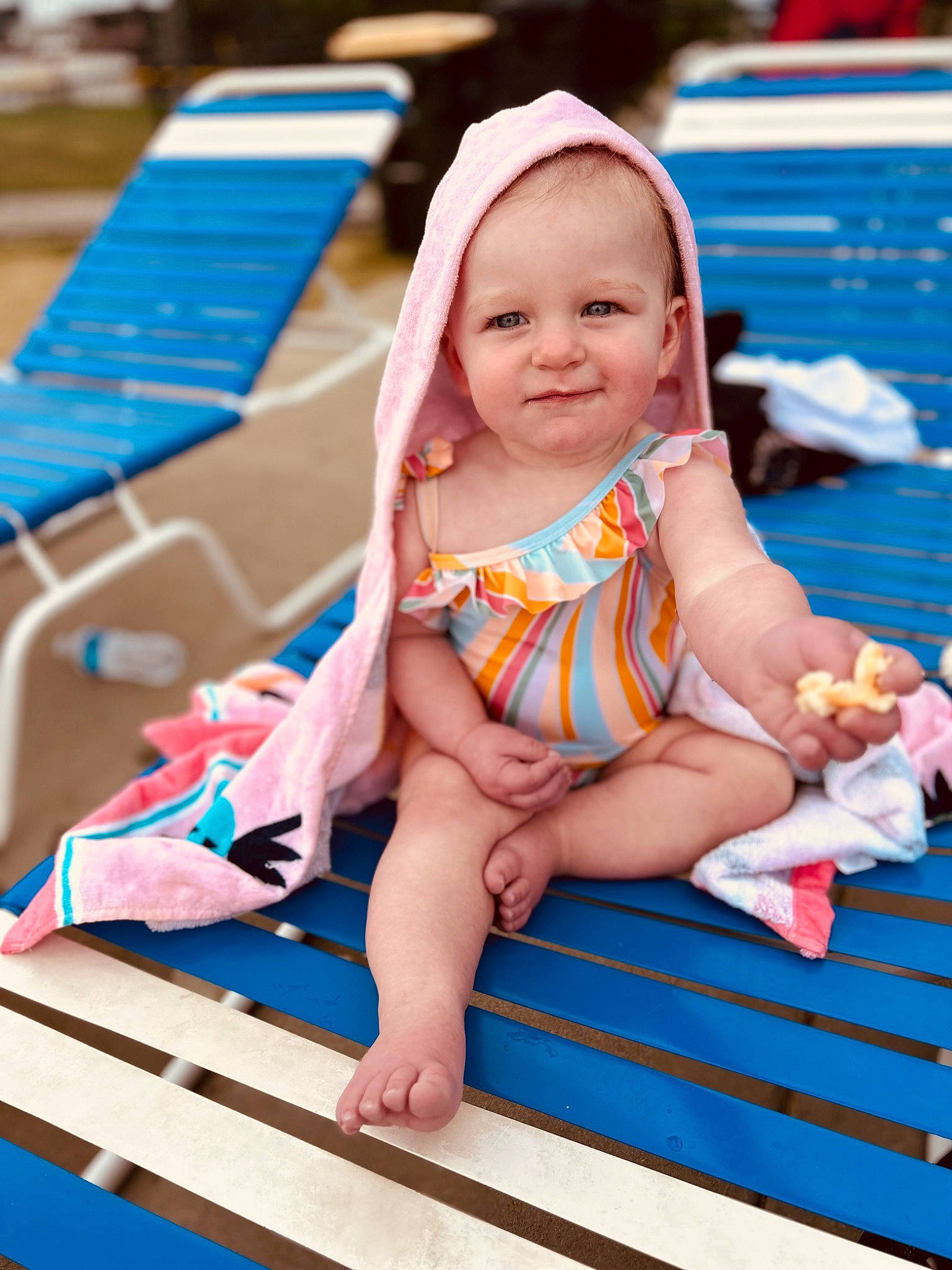 Sylvie joined the competition — help win amazing prizes! aqua, baby, baby_toddler_clothing, blue, chair, child, event, finger, foot, fun, happy, hat, joy, leisure, person, pink, recreation, sitting, skin, smile