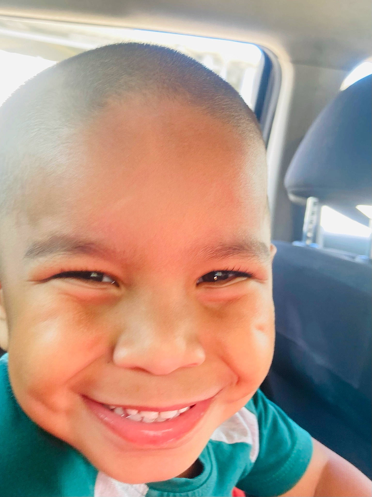 Esaie participe au concours pour gagner de l'argent avec cette photo : cheek, child, chin, ear, eyebrow, eyelash, forehead, fun, happy, iris, jaw, joy, lip, mouth, neck, nose, person, skin, smile, toddler