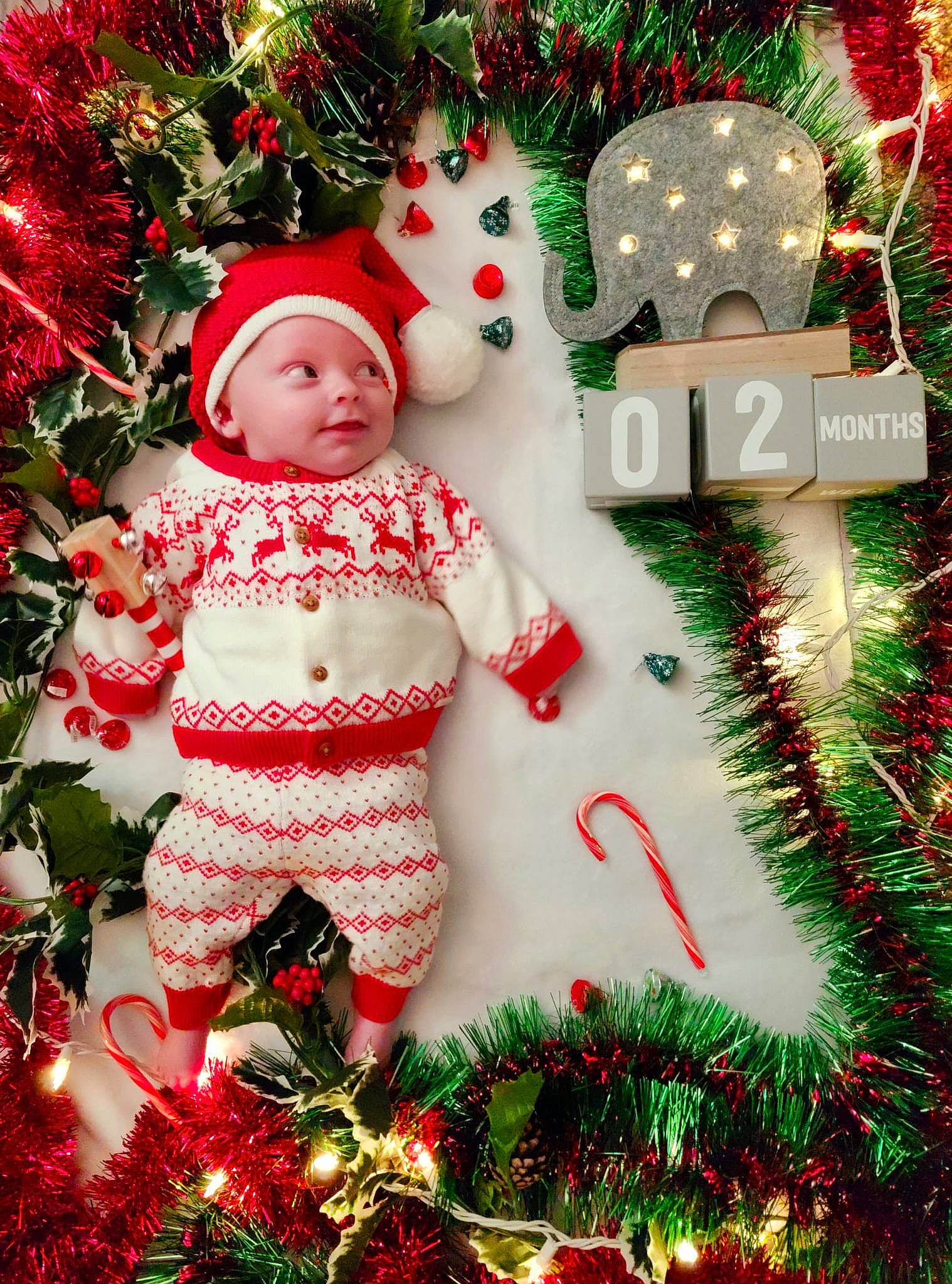 Finlay is registered to the contest to win money with this photo: christmas, christmas_decoration, christmas_eve, christmas_ornament, christmas_tree, conifer, event, evergreen, fictional_character, green, happy, headwear, holiday, holiday_ornament, interior_design, ornament, person, plant, santa_claus, tradition