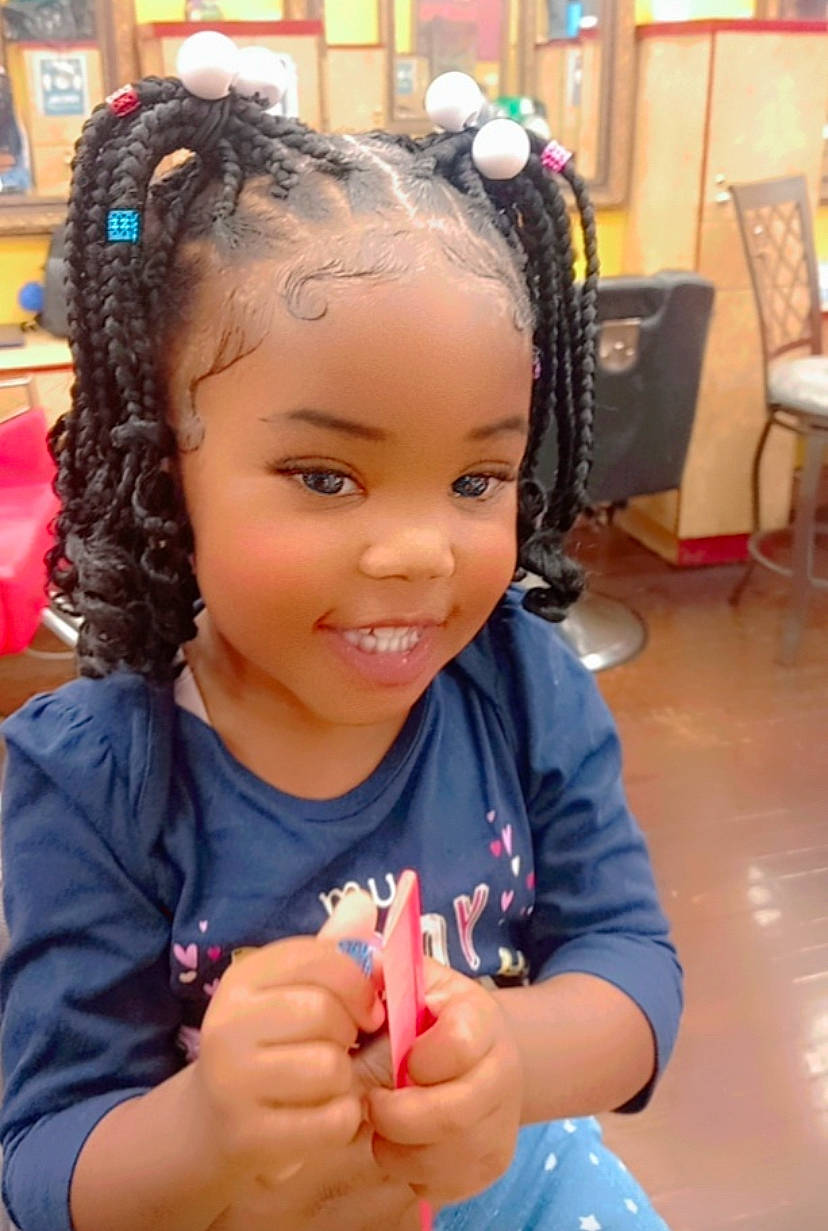 Taylin joined the competition — help win amazing prizes! black_hair, chair, child, dreadlocks, event, eye, finger, fun, gesture, hand, happy, joy, long_hair, nail, people, person, skin, smile, snapshot, sweetness