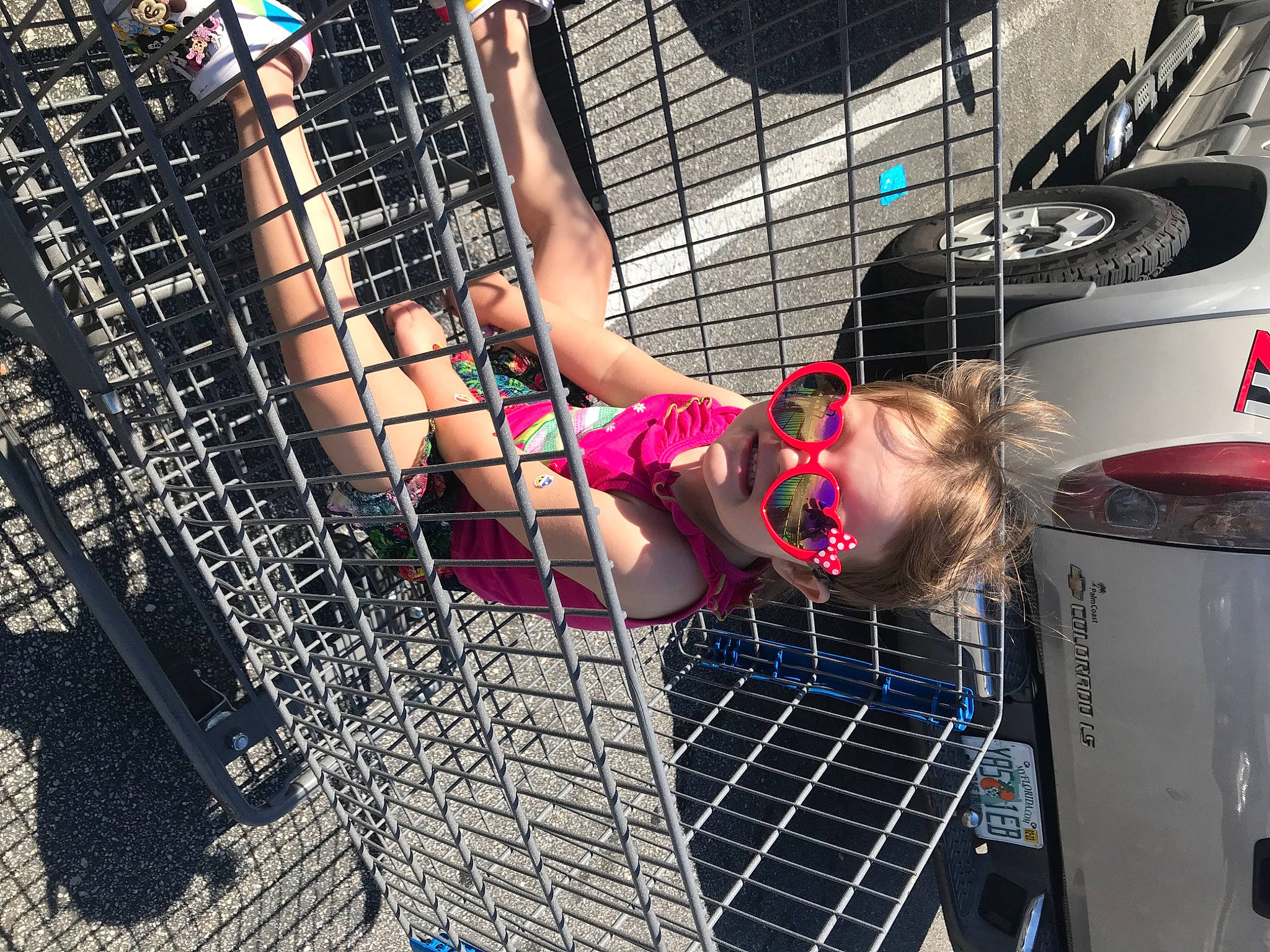 Scarlet joined the competition — help win amazing prizes! automotive_exterior, automotive_tire, black_hair, bumper, car, flash_photography, fun, human_body, human_leg, leisure, mesh, motor_vehicle, muscle, net, pattern, person, sandal, shorts, thigh, tire