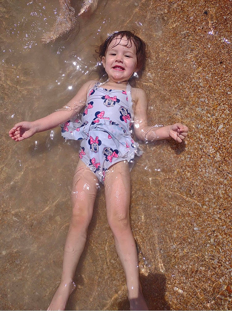 Scarlet is registered to the contest to win money with this photo: barefoot, dress, eye, face, finger, flash_photography, fun, grass, hair, happy, head, joy, leg, people_in_nature, person, pink, plant, skin, smile, thigh