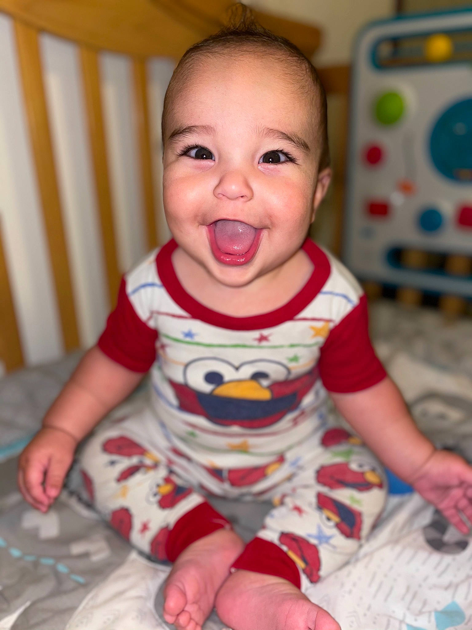 Jaylon is registered to the contest to win money with this photo: baby, baby_toddler_clothing, cheek, child, chin, facial_expression, flooring, fun, happy, home_appliance, iris, pattern, person, product, sitting, skin, sleeve, smile, t_shirt, toddler