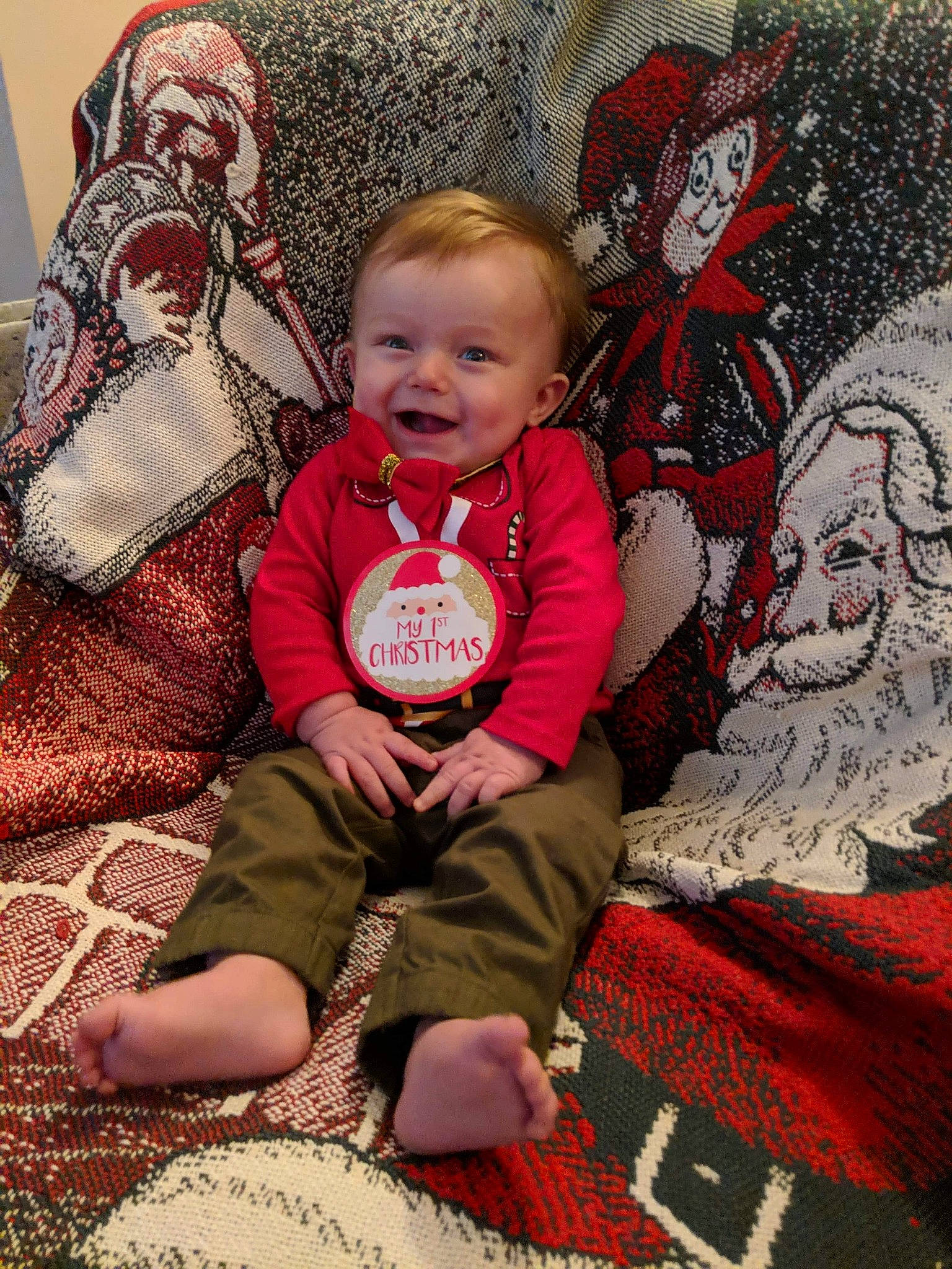 Bryton joined the competition — help win amazing prizes! baby, child, christmas, christmas_eve, family, joy, lap, person, sitting, smile, toddler, tree
