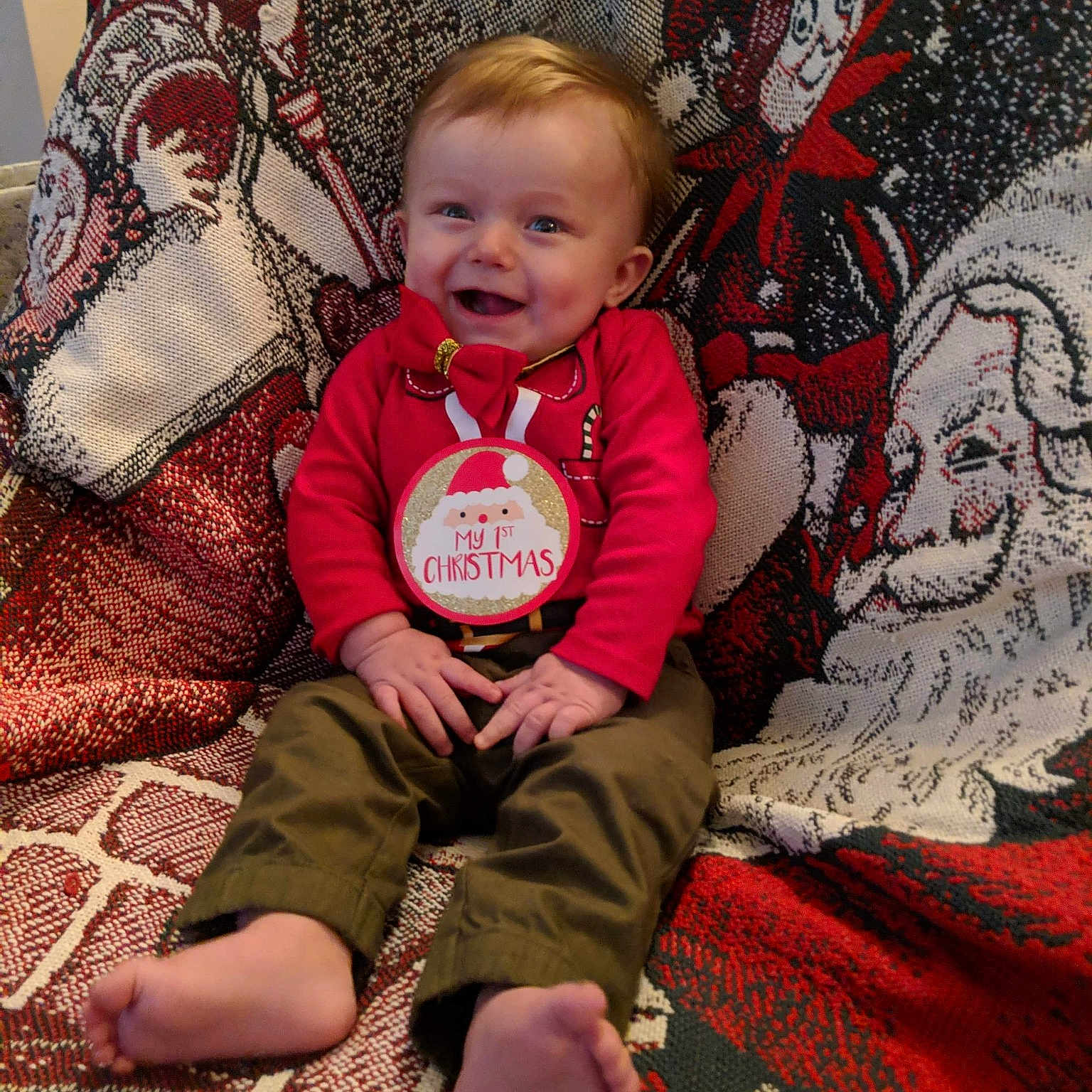 Bryton joined the competition — help win amazing prizes! baby, child, christmas, christmas_eve, family, joy, lap, person, sitting, smile, toddler, tree