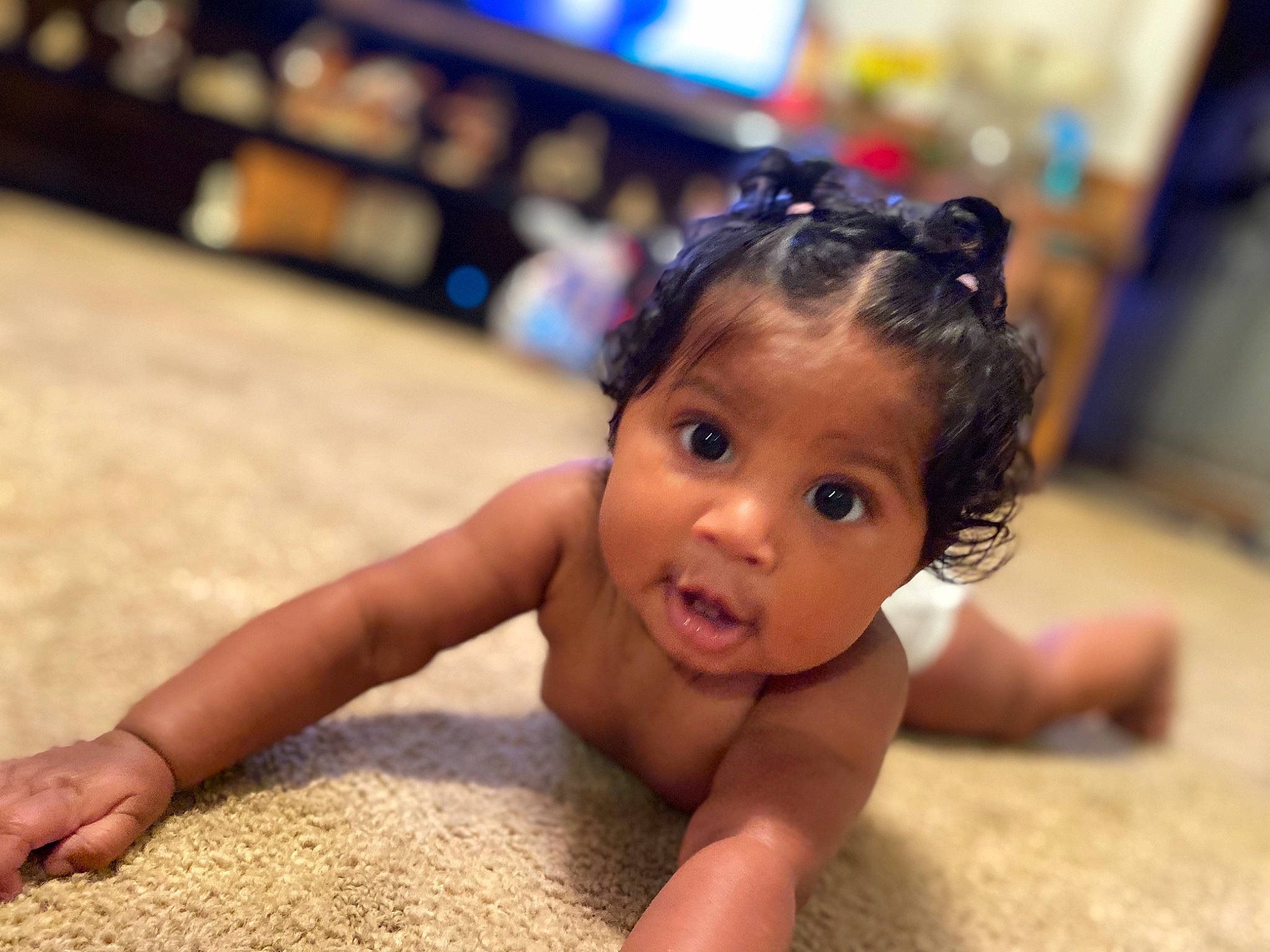 Melani joined the competition — help win amazing prizes! chest, child, fawn, floor, flooring, foot, fun, hair, happy, hardwood, head, leisure, nonbuilding_structure, person, smile, surprise, television, thumb, toddler, toy