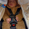 baby, sleeping, car_seat, fuzzy_suit, child, toddler, safety_harness, cute, cozy, infant, clothing, hands, face, closed_eyes, transport, seatbelt, soft_texture, adorable, indoor, resting