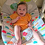 Brayleanna joined the competition — help win amazing prizes! baby, baby_rocker, cheerful, child, colorful, cute, feet, happy, headband, indoor, infant, legs, orange_clothing, patterned, person, playful, seat, smiling, toy, young_child