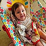 baby, baby_seat, blanket, child, circles, clothing, colorful, comfort, face, floor, foot, happy, indoors, infant, pattern, person, portrait, seat, skin, smile