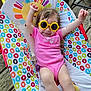 Brayleanna is registered to the contest to win money with this photo: arms_up, baby, baby_chair, child, colorful_chair, cute, happy, infant, outdoor, pink_onesie, playful, rainbow_colors, relaxing, smiling, summer, sun_pattern, sunglasses, sunshine, toddler, wooden_porch