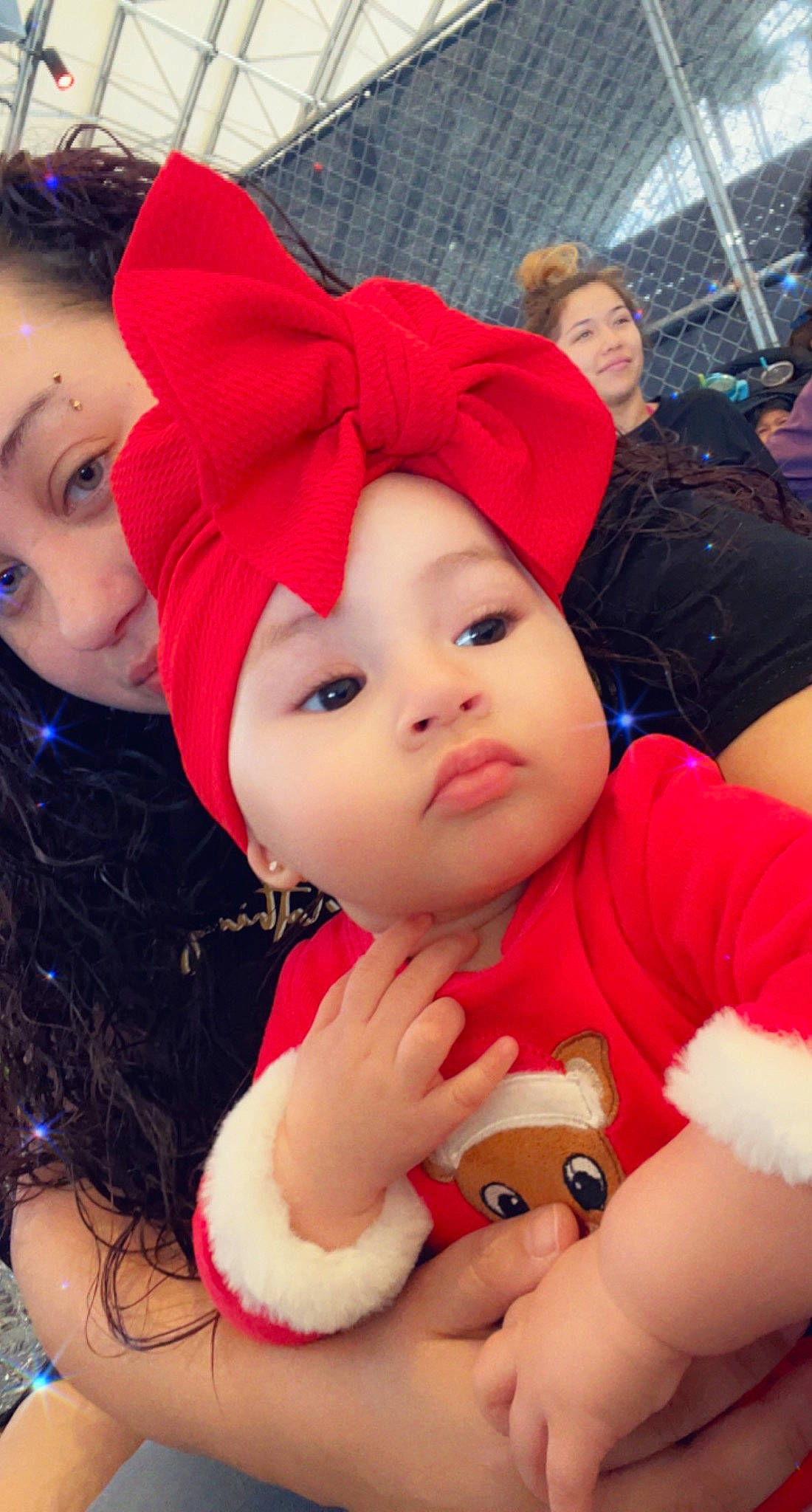 Kara joined the competition — help win amazing prizes! baby, beanie, cap, child, event, fashion_accessory, fun, fur, happy, hat, headgear, headwear, knit_cap, lip, magenta, person, pink, recreation, red, skin