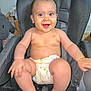 baby, smiling, highchair, diaper, food_smear, happy, blue_eyes, chubby_legs, sitting, indoor, feeding_time, messy, skin, toes, hands, chair, seatbelt, portrait, closeup, infant