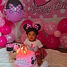 Miley joined the competition — help win amazing prizes! toddler, birthday, cake, candles, balloons, pink, white, minnie_mouse, headband, party, celebration, child, cute, indoor, floor, decorations, happy_birthday, banner, plush_rug, curious