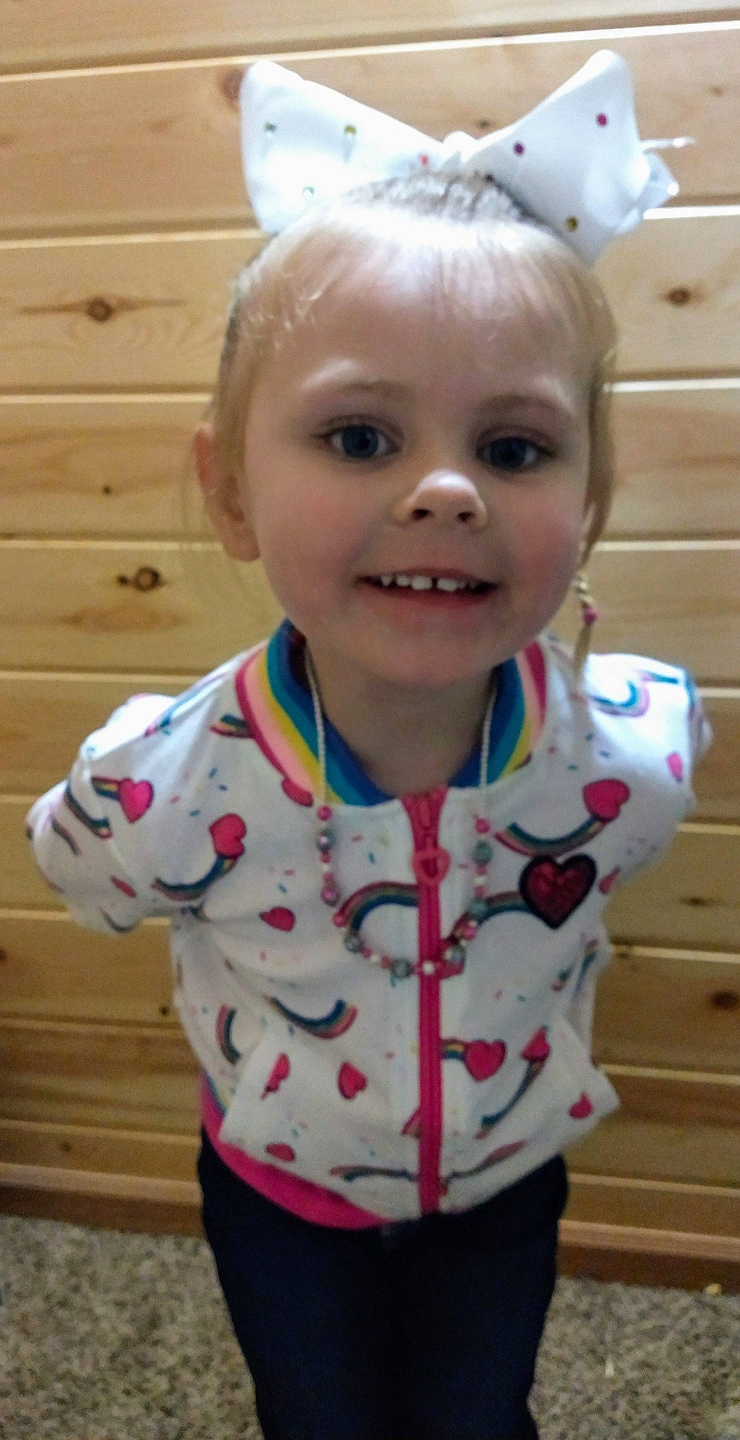 Jorja joined the competition — help win amazing prizes! baby, cheek, child, face, head, joy, person, skin, sleeve, smile, standing, toddler